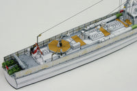 Photo of HMV Harbor S-boat S7–S13 papermodel kit in 1/250 scale with two detailed ships and pier