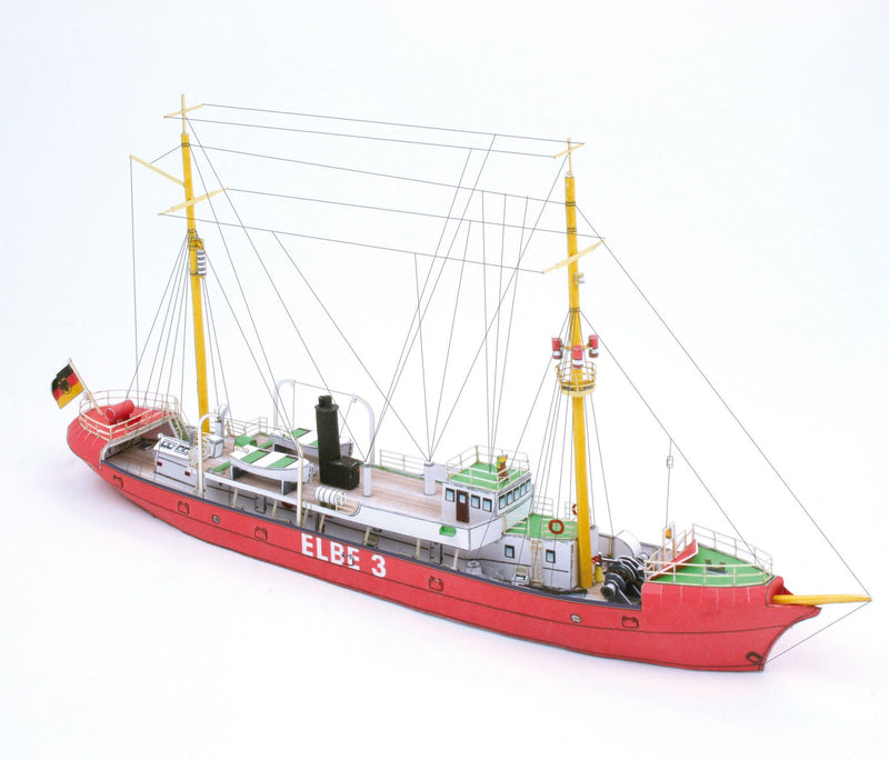 Photo of HMV Light Vessel Elbe 3 Card Model Kit 1/250 showing detailed red hull, weathered deck, and filigree stern design