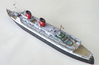 Photo of HMV TS Hanseatic 1/250 card model kit showing detailed superstructure, lifeboats, and elegant hull design by Peter Brandt
