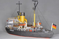 Photo of HMV Steam Icebreaker STETTIN card model kit 1:250 showing detailed paper model of the German museum ship with masts, rigging, and bridge interior