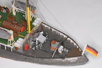 Photo of HMV Steam Icebreaker STETTIN card model kit 1:250 showing detailed paper model of the German museum ship with masts, rigging, and bridge interior