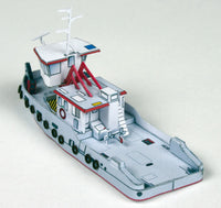 Photo of HMV Modern Harbor Boats 1/250 card model kit showing eight detailed paper ships including customs boats, tugboat, pilot cutters, and police boats.
