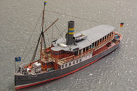 Photo of HMV Passenger Steamer Alexandra 1/250 card model kit showing detailed decks, lifeboat, and superstructure.