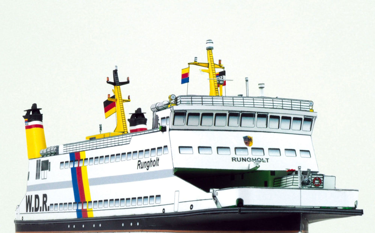 Photo of HMV papermodel kit Ferryboat Rungholt in 1:250 scale showing detailed ferry with open car deck, funnels, and passenger seating.
