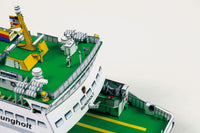 Photo of HMV papermodel kit Ferryboat Rungholt in 1:250 scale showing detailed ferry with open car deck, funnels, and passenger seating.