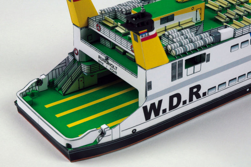 Photo of HMV papermodel kit Ferryboat Rungholt in 1:250 scale showing detailed ferry with open car deck, funnels, and passenger seating.