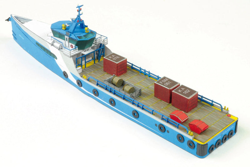 Photo of HMV Fast Crew Supplier Doña Diana 1:250 paper model ship kit designed by Till Schade, featuring blue Axe-Bow hull and deck cargo.