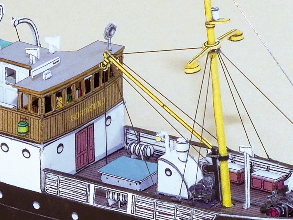 Photo of HMV 1:250 Norwegian Steamer Børøysund Paper Model Kit showing detailed bridge, capstan, and steamer stern designed by Andreas Jacobsen.