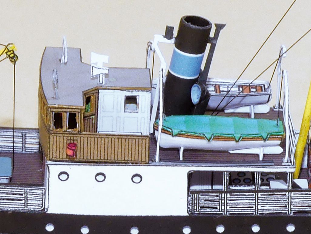 Photo of HMV 1:250 Norwegian Steamer Børøysund Paper Model Kit showing detailed bridge, capstan, and steamer stern designed by Andreas Jacobsen.