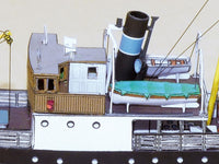 Photo of HMV 1:250 Norwegian Steamer Børøysund Paper Model Kit showing detailed bridge, capstan, and steamer stern designed by Andreas Jacobsen.