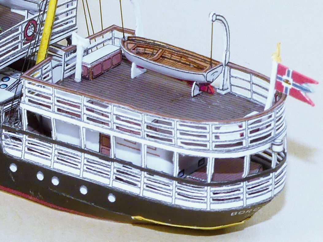Photo of HMV 1:250 Norwegian Steamer Børøysund Paper Model Kit showing detailed bridge, capstan, and steamer stern designed by Andreas Jacobsen.