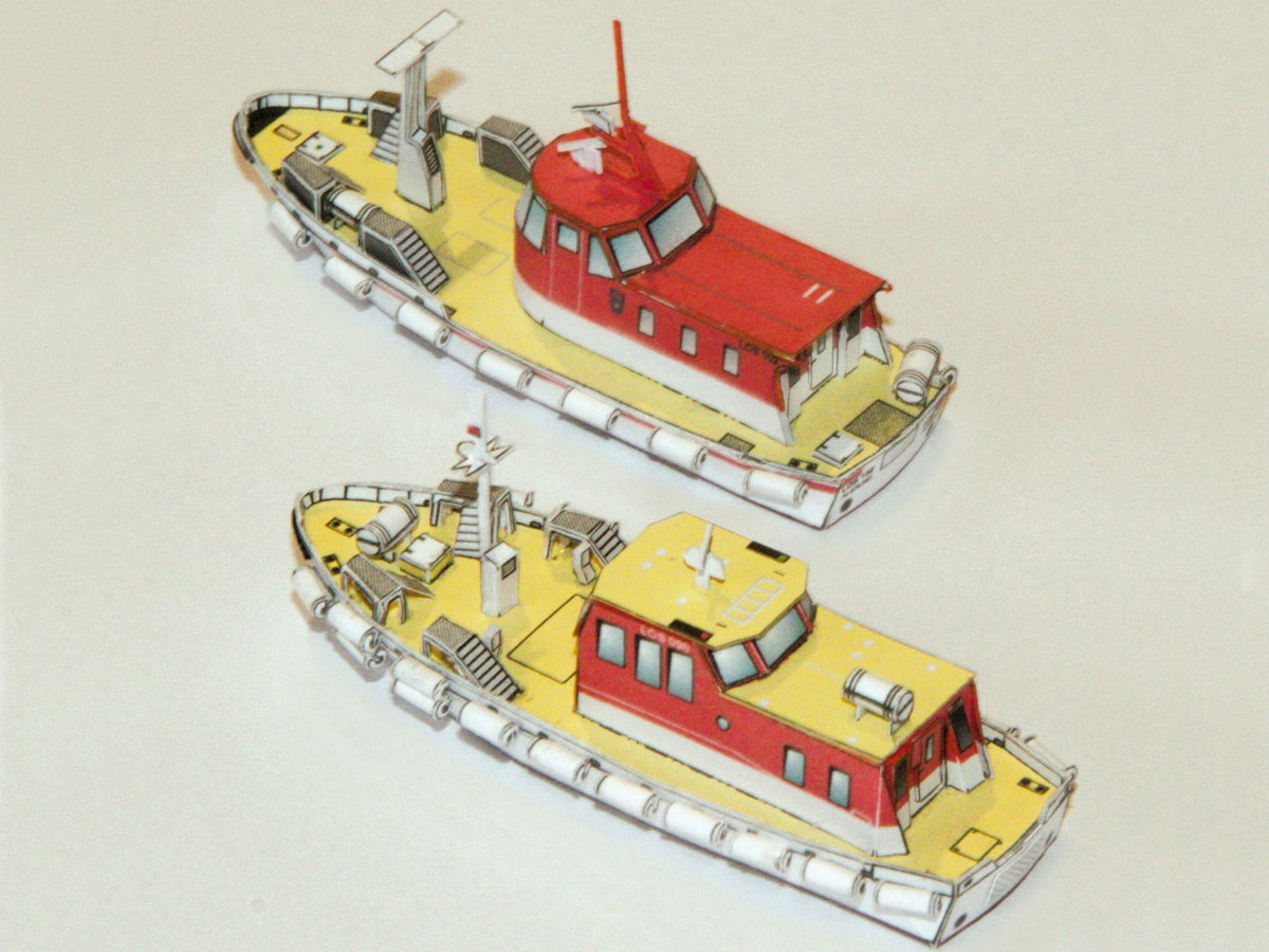 Photo of HMV Norwegian Pilot Boat Card Model Kit 1/250 (103340) featuring six detailed Norwegian pilot boats and a Colin Archer cutter from different eras.