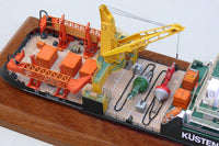 Photo of the HMV Multipurpose Vessel Mellum card model kit in 1:250 scale, showing detailed superstructure, movable crane, and coast guard equipment