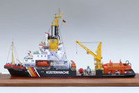 Photo of the HMV Multipurpose Vessel Mellum card model kit in 1:250 scale, showing detailed superstructure, movable crane, and coast guard equipment