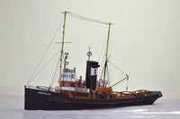Photo of the HMV card model kit of the 1924 salvage tug Seefalke in 1:250 scale with trawler Lappland and tug Scheelenkuhlen.