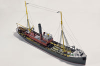 Photo of the HMV card model kit of the 1924 salvage tug Seefalke in 1:250 scale with trawler Lappland and tug Scheelenkuhlen.