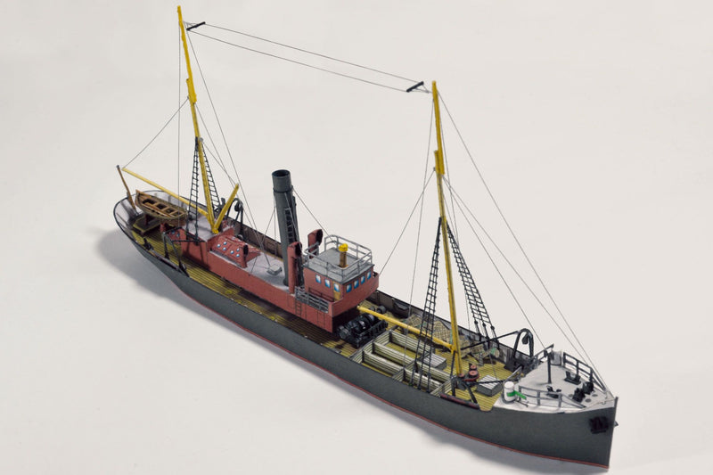 Photo of the HMV card model kit of the 1924 salvage tug Seefalke in 1:250 scale with trawler Lappland and tug Scheelenkuhlen.