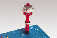 Photo of HMV Lighthouse Tegeler Plate 1/250 paper model kit showing completed lighthouse model with base and printed details