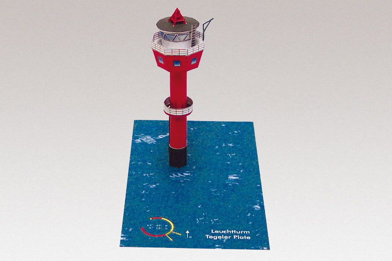 Photo of HMV Lighthouse Tegeler Plate 1/250 paper model kit showing completed lighthouse model with base and printed details