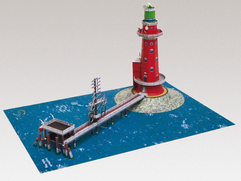 Photo of HMV Hohe Weg Aussenweser Lighthouse 1:250 card model kit showing detailed paper parts, wind semaphore, and water base.