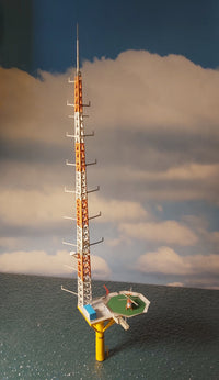 Photo of HMV Research Platform FINO 3 paper model kit in 1:250 scale with helicopter and ocean base