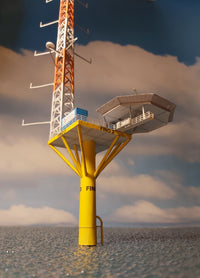 Photo of HMV Research Platform FINO 3 paper model kit in 1:250 scale with helicopter and ocean base