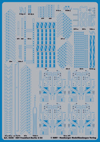 A blue model kit decal sheet with various printed striping, markings, and geometric patterns for model aircraft, labeled with parts like V19-41, 871, 36f, and E3.