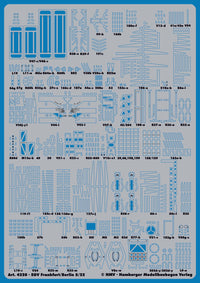 A light blue sheet of model kit decals or transfer sheets with many small printed blue outlines and labels, photographed flat against a matching blue background. Small text at the bottom reads 'Art.