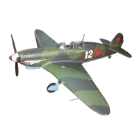 A model or toy military fighter airplane shown alone on a plain white background. The aircraft has a green camouflage paint scheme with red stars, white '12' markings, and small light blue accents on the wing and nose area.