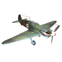 A scale model of a vintage military fighter plane, painted in a green camouflage pattern with red star insignias and the number 12 on the fuselage, isolated on a white background.