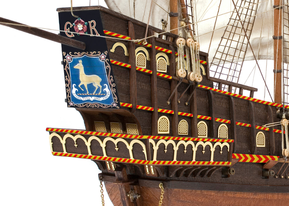 Photo of OcCre Golden Hind 1:85 wooden model ship kit showing detailed wooden hull and historical galleon design.
