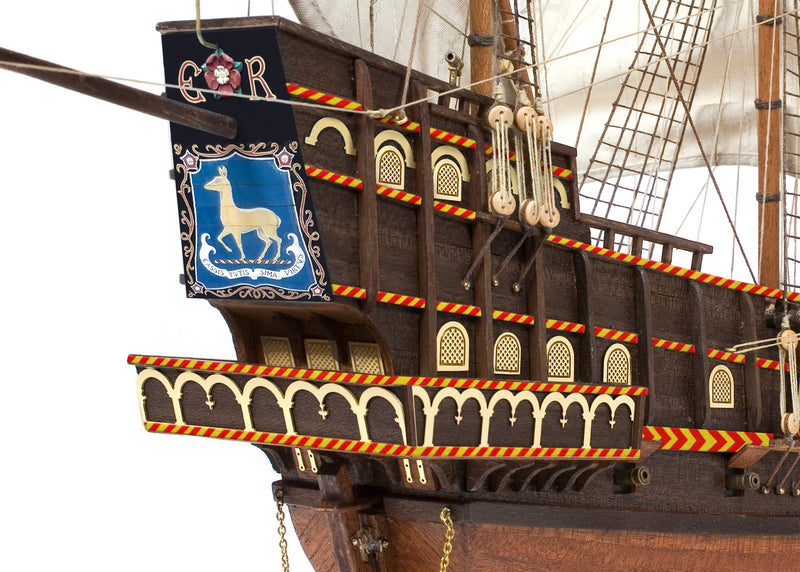 Photo of OcCre Golden Hind 1:85 wooden model ship kit showing detailed wooden hull and historical galleon design.