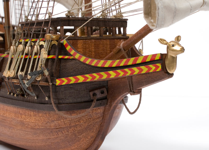 Photo of OcCre Golden Hind 1:85 wooden model ship kit showing detailed wooden hull and historical galleon design.