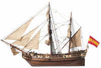 Photo of the La Candelaria 1:85 wooden model ship kit by OcCre showcasing detailed hull, masts and deck features