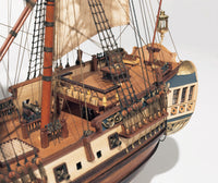 Photo of the La Candelaria 1:85 wooden model ship kit by OcCre showcasing detailed hull, masts and deck features