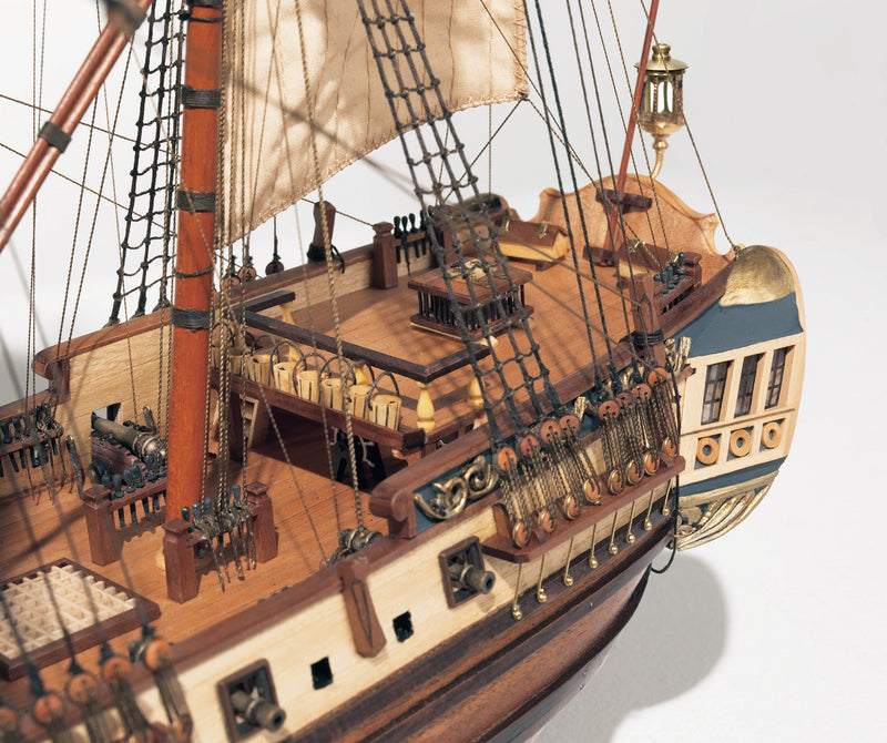 Photo of the La Candelaria 1:85 wooden model ship kit by OcCre showcasing detailed hull, masts and deck features