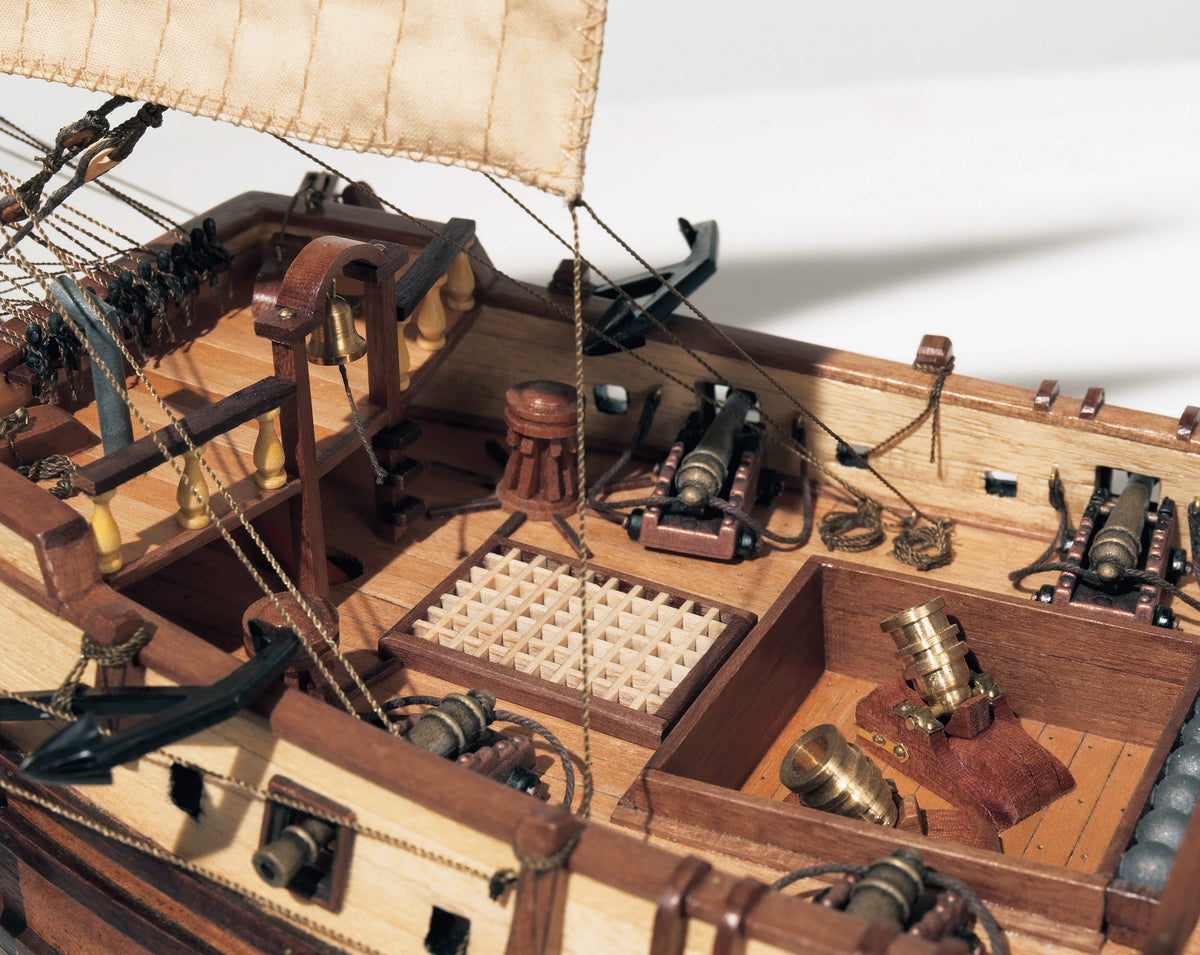 Photo of the La Candelaria 1:85 wooden model ship kit by OcCre showcasing detailed hull, masts and deck features