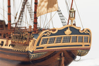 Photo of the La Candelaria 1:85 wooden model ship kit by OcCre showcasing detailed hull, masts and deck features