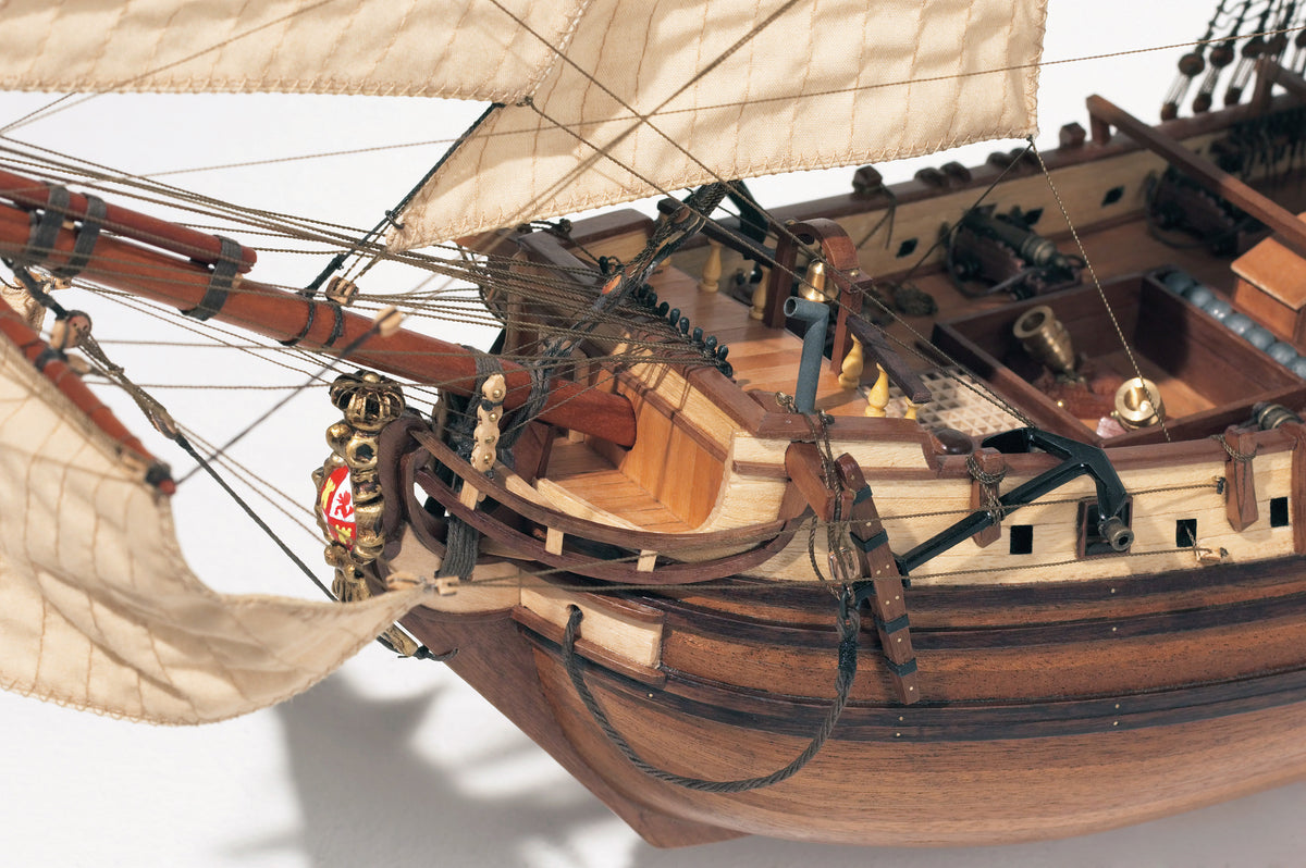 Photo of the La Candelaria 1:85 wooden model ship kit by OcCre showcasing detailed hull, masts and deck features