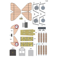 A flat technical layout sheet showing multiple pre-cut parts and decals for a model aircraft or wing assembly, with numbered components, gray outline drawings, and wood-grain patterned pieces on a white background.