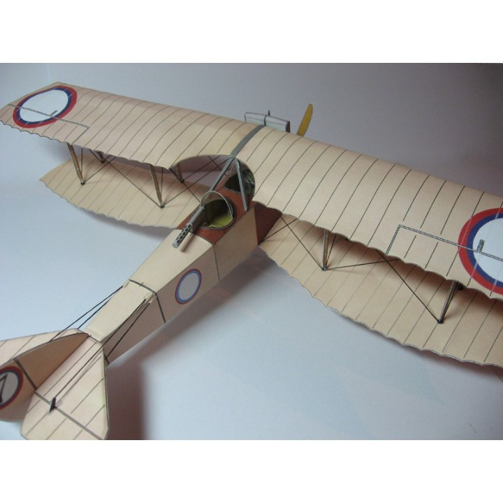 A vintage-style wooden model airplane with a light beige wood-grain finish, featuring roundel insignias on the wings and tail, photographed on a plain light gray background.
