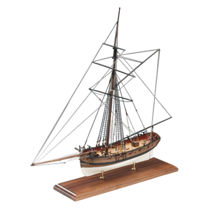 Image of Amati's Lady Nelson model ship, displaying its intricate design and craftsmanship. The model features detailed rigging, a meticulously crafted deck, and an authentic wooden hull, representative of early 19th-century naval vessels. The image captures the historical elegance and complexity of this iconic ship model, ideal for maritime enthusiasts and collectors.