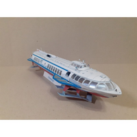 A model passenger ferry or cruise ship displayed on a small stand against a plain beige background.
