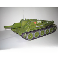 An olive green model or miniature tank with white markings, a red star, and the number 5234, photographed on a plain light background.