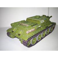 A green military model tank with purple treads, white markings, and the number 15234 on its side, photographed against a plain light background.