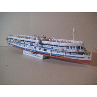 A detailed model of a Russian cruise ship, displayed on a small white stand against a plain beige background.