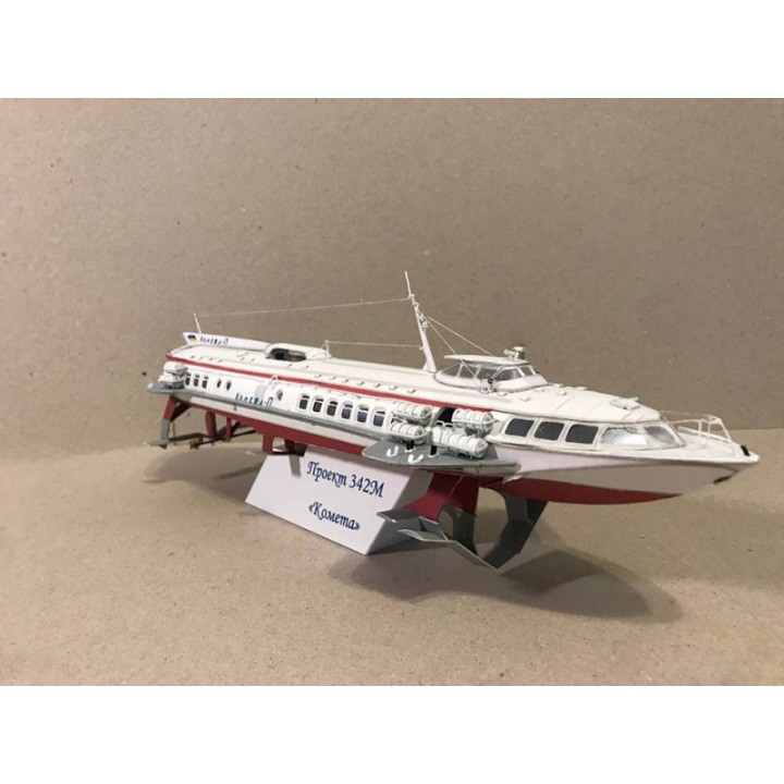 A detailed model of the Soviet project 343M passenger ship 'Krasny' on a display stand, photographed against a neutral beige background.