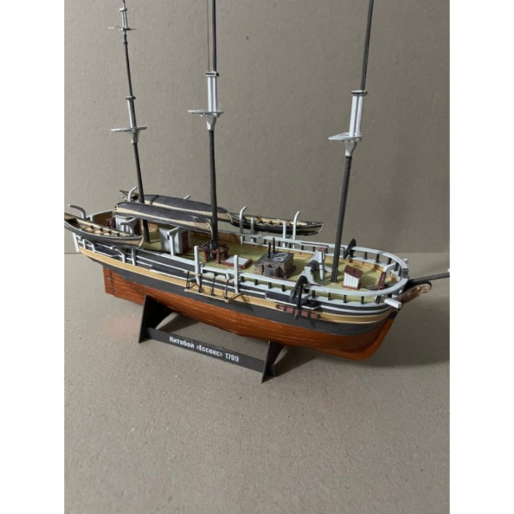 A detailed model of the historic ship Herblock's Oceanic (1769) on a wooden display stand, photographed against a neutral beige background.