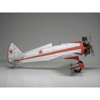 A scale model of a vintage twin-engine propeller airplane, featuring a white fuselage with bold red stripes and red star insignias, set against a neutral gray studio background.