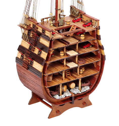 Photo of the Santísima Trinidad cross-section model kit by OcCre in 1/90 scale, showcasing detailed inner ship structure and mainmast elements.